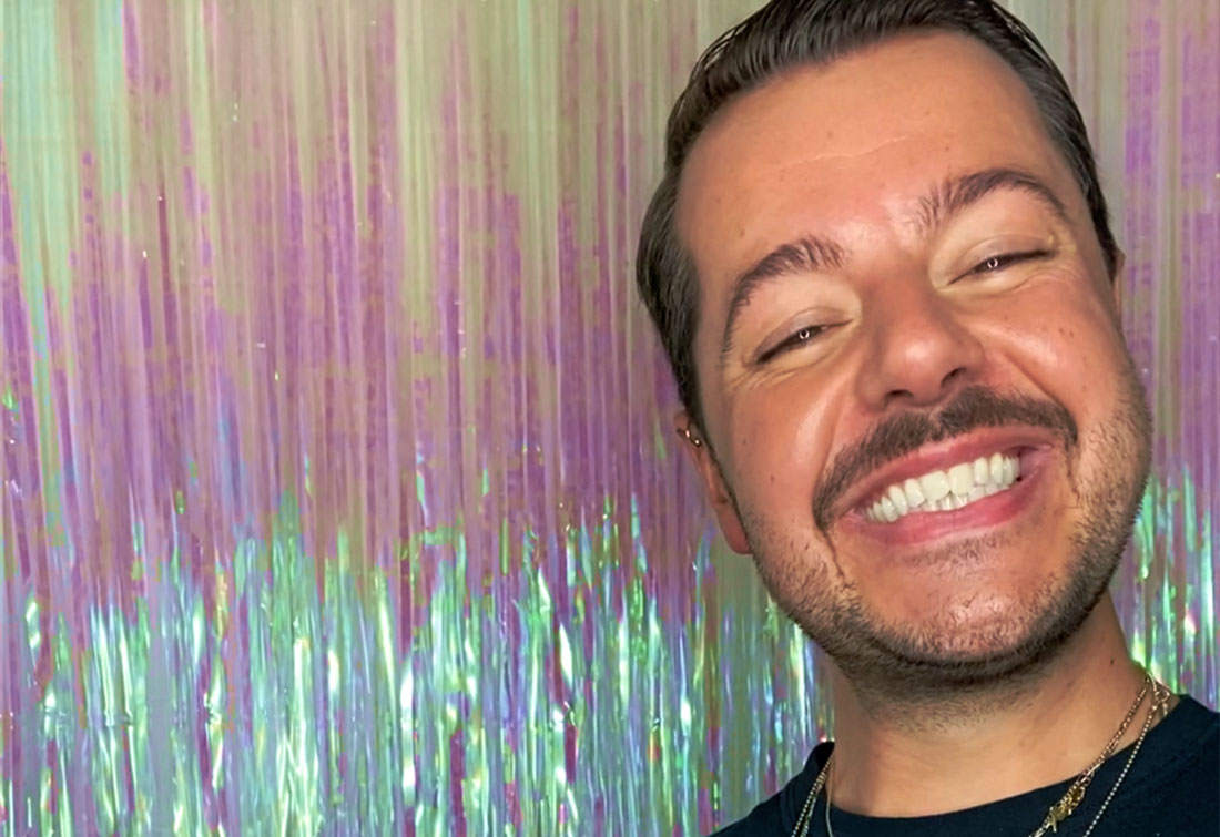 Jules close up on neon backdrop