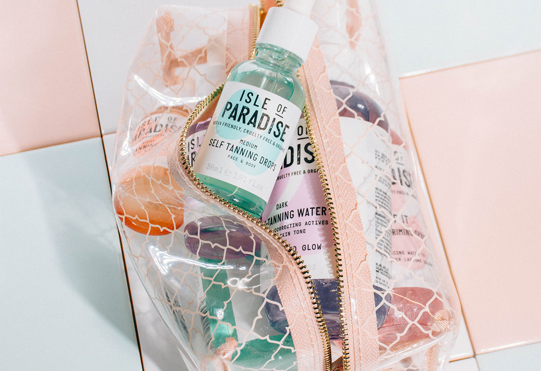 Cosmetics bag containing various Isle of Paradise Products